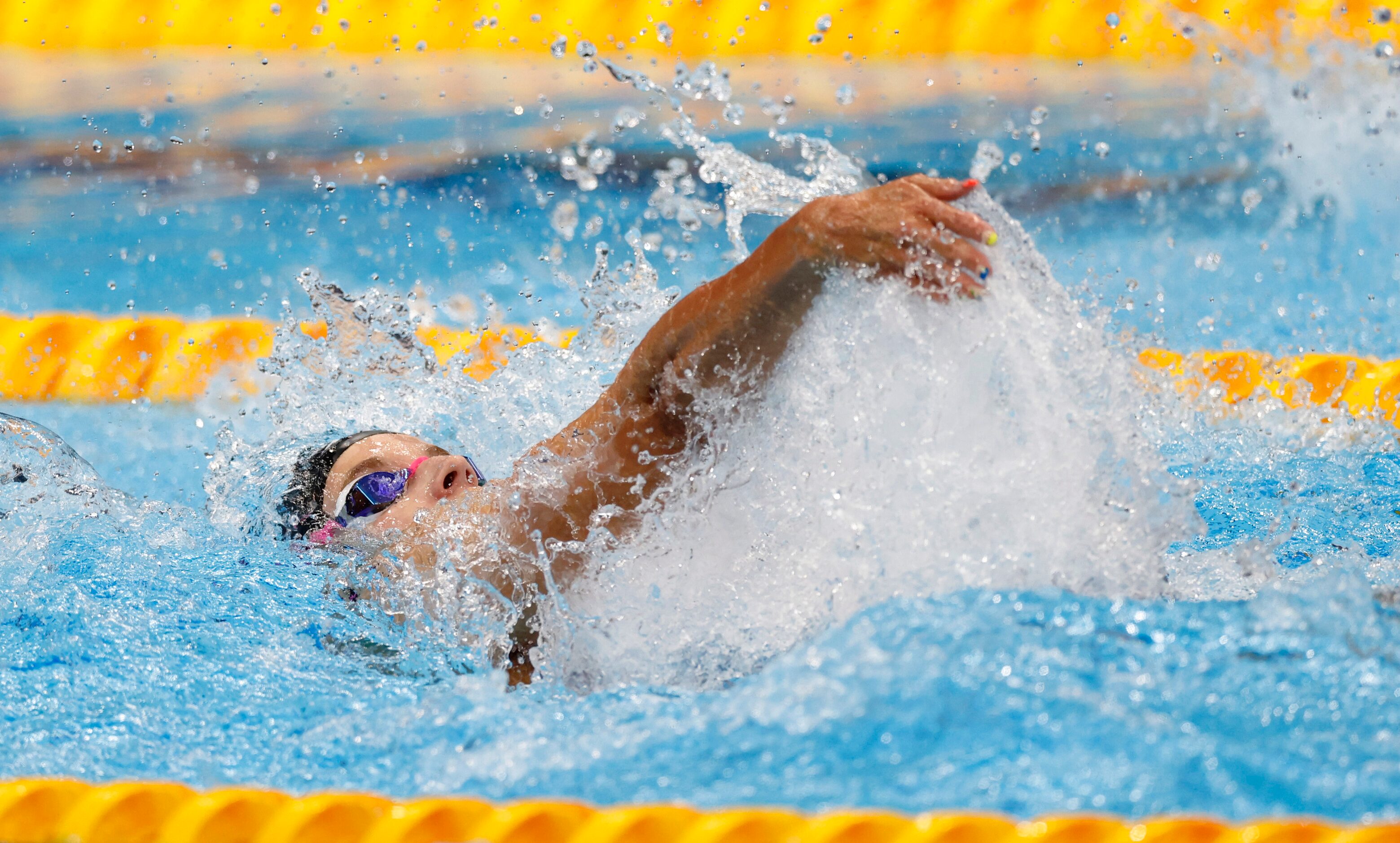 USA’s Regan Smith competes in the women’s 100 meter backstroke final during the postponed...