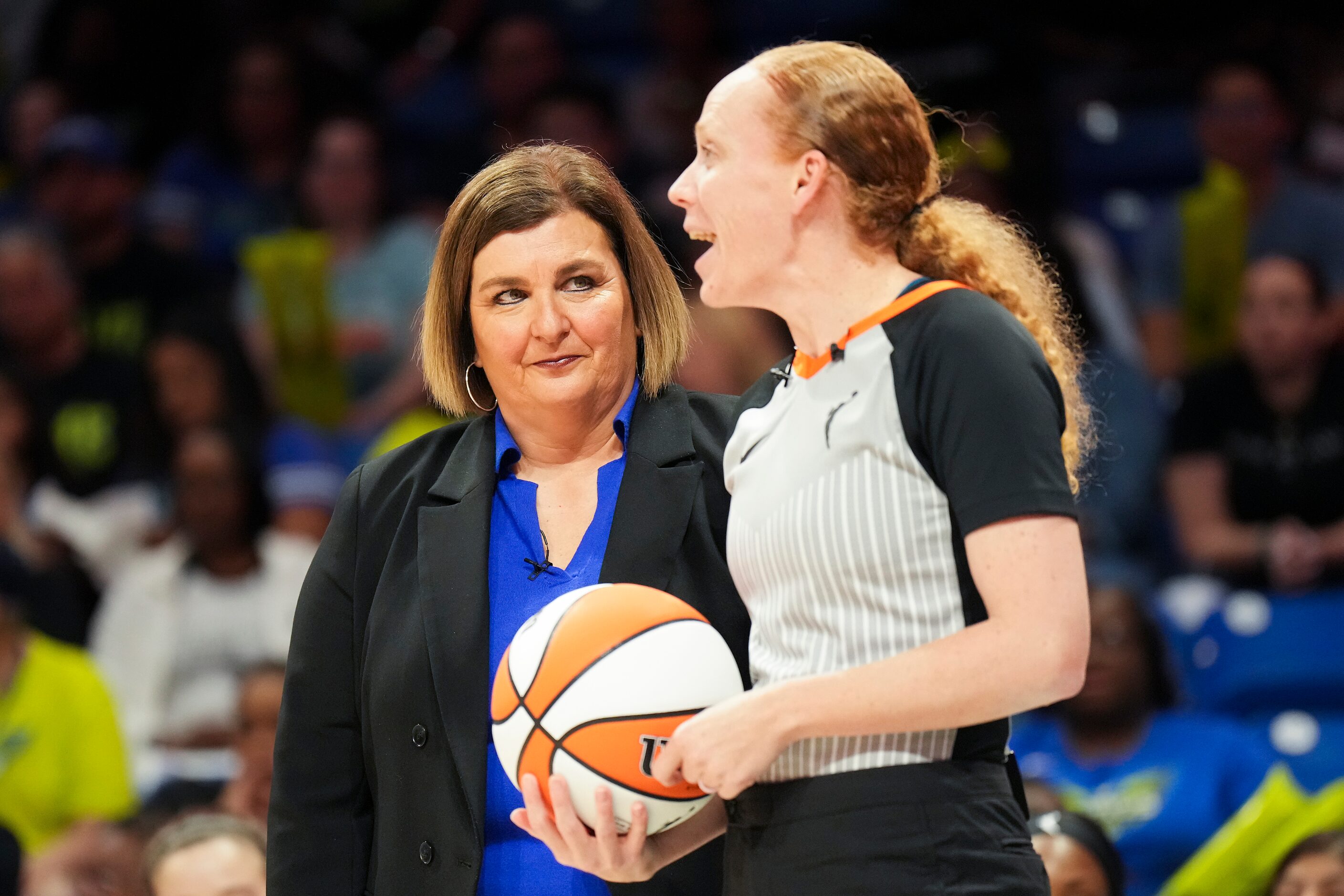 Dallas Wings head coach Latricia Trammell talks to an official during the first half of a...