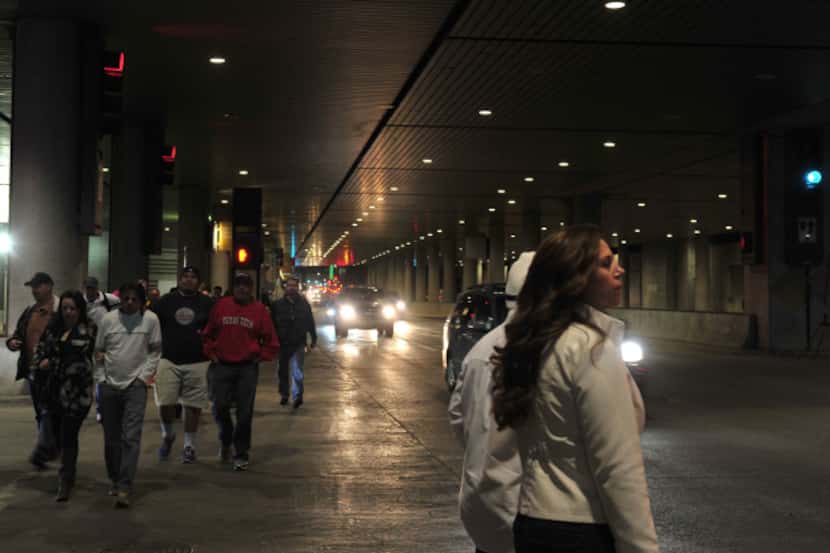 Pedestrians walked Saturday near DART's Convention Center  Station, which will  soon undergo...