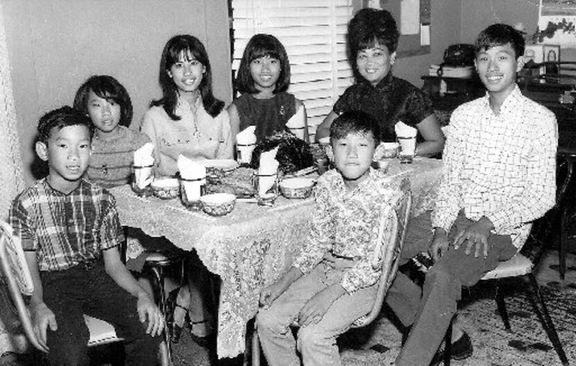 A family photo of the Chu family at their first Thanksgiving dinner in the U.S. (clockwise...