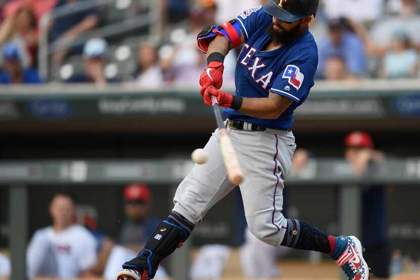 MINNEAPOLIS, MN - JULY 07: Rougned Odor #12 of the Texas Rangers hits a three-run home run...