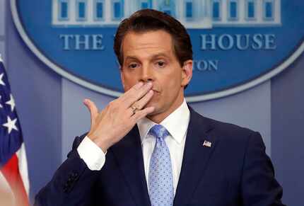 Incoming White House communications director Anthony Scaramucci, right, blowing a kiss after...