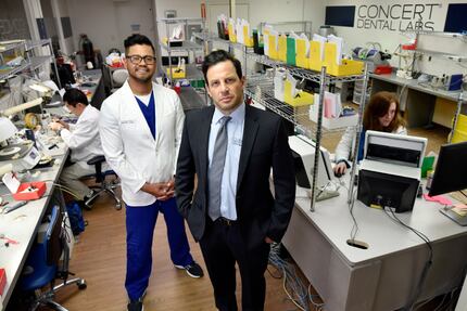 Vice president and certified dental technician, Felix Silva, left, and founder David Lesh,...