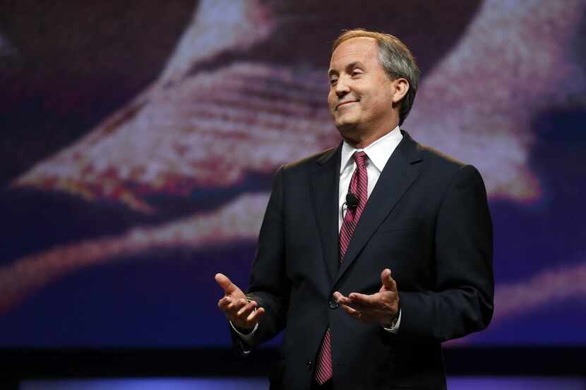  Texas Attorney General Ken Paxton, shown as he campaigned at the state GOP convention, has...