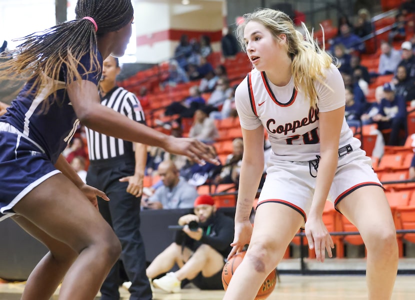 Little Elm sophomore guard Amina Diallo (10, left) guards Coppell senior guard Julianna...