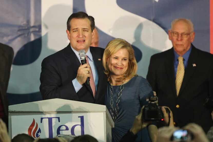Sen. Ted Cruz stands with his wife, Heidi, at the Iowa State Fairgrounds in Des Moines on...