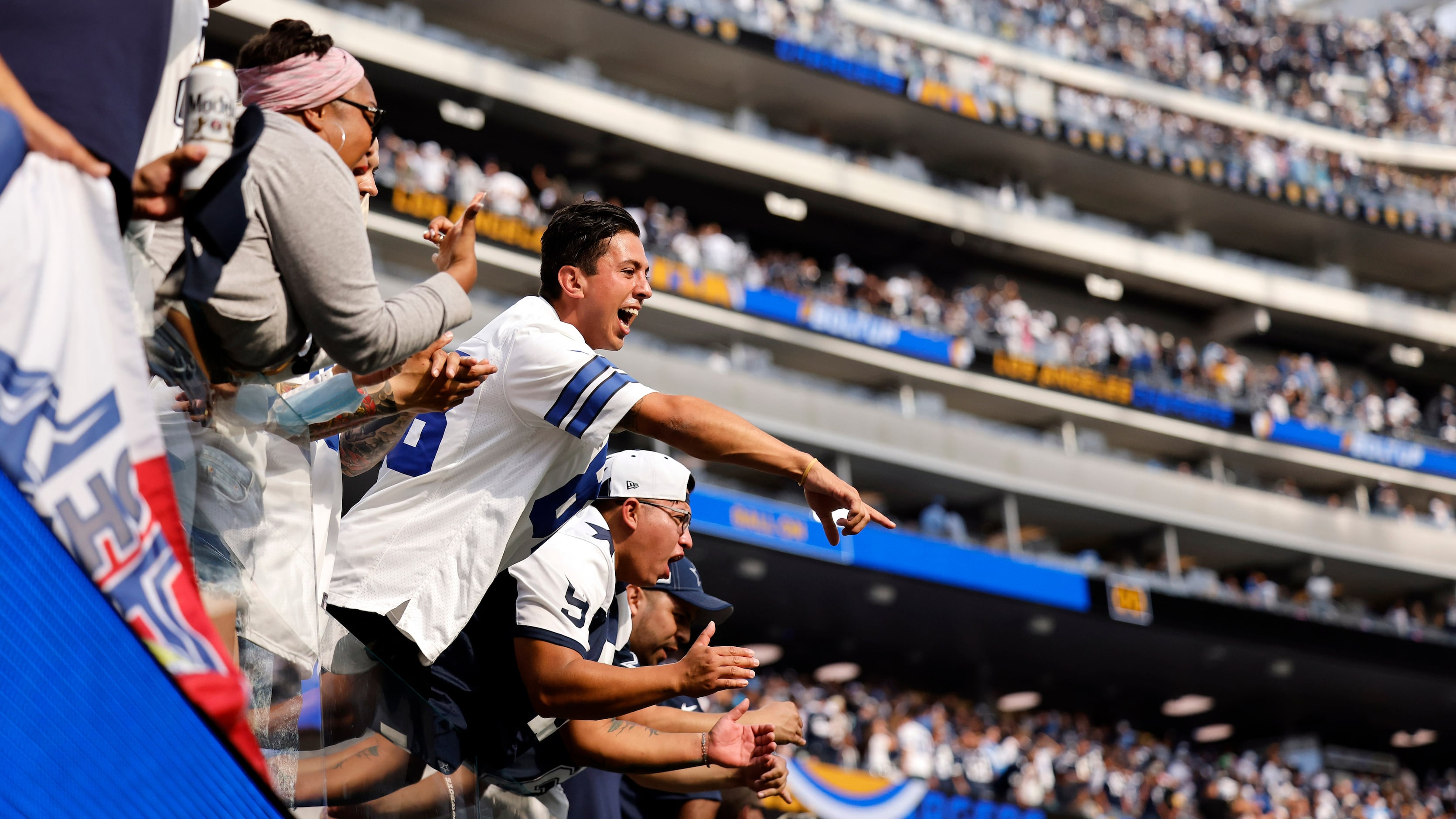 Chargers tackle Rams in SoFi's first game with fans