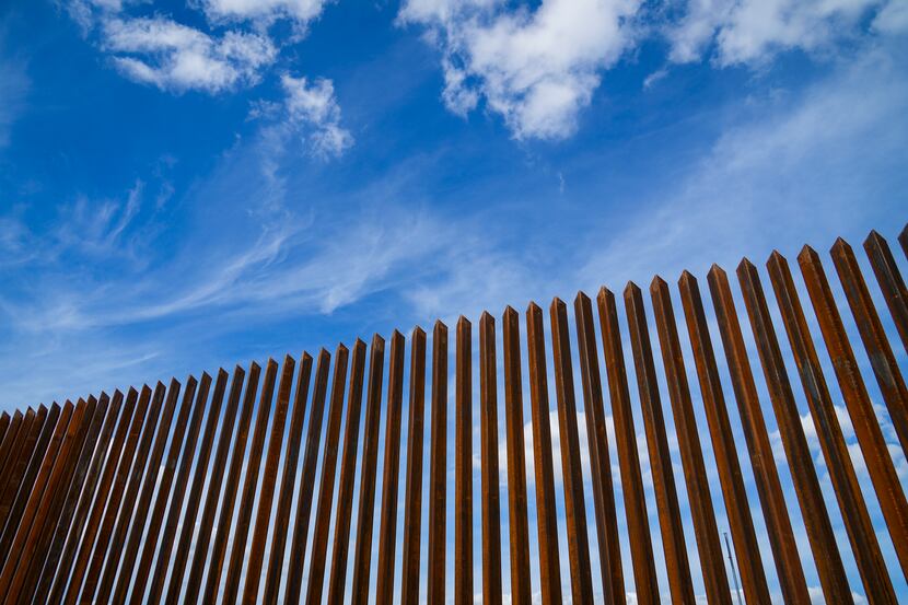 A section of border fence consisting of steel bollard panels near Texas Highway 480 in Eagle...