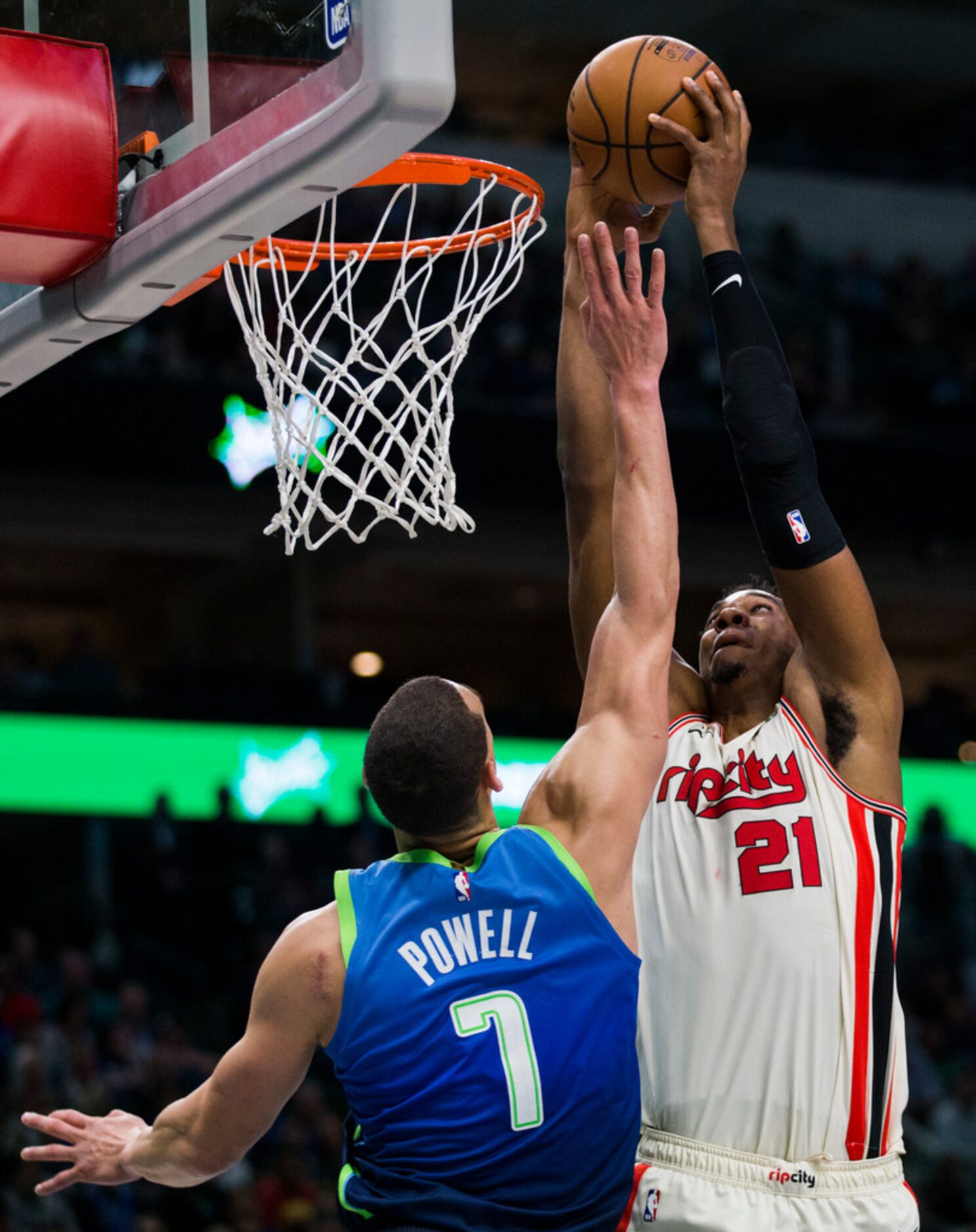 Portland Trail Blazers center Hassan Whiteside (21) dunks over Dallas Mavericks forward...