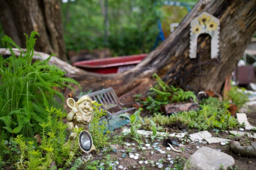 A small "hobbit garden" Bobbie Mason made for her grandchildren in Red Oak on Thursday,...