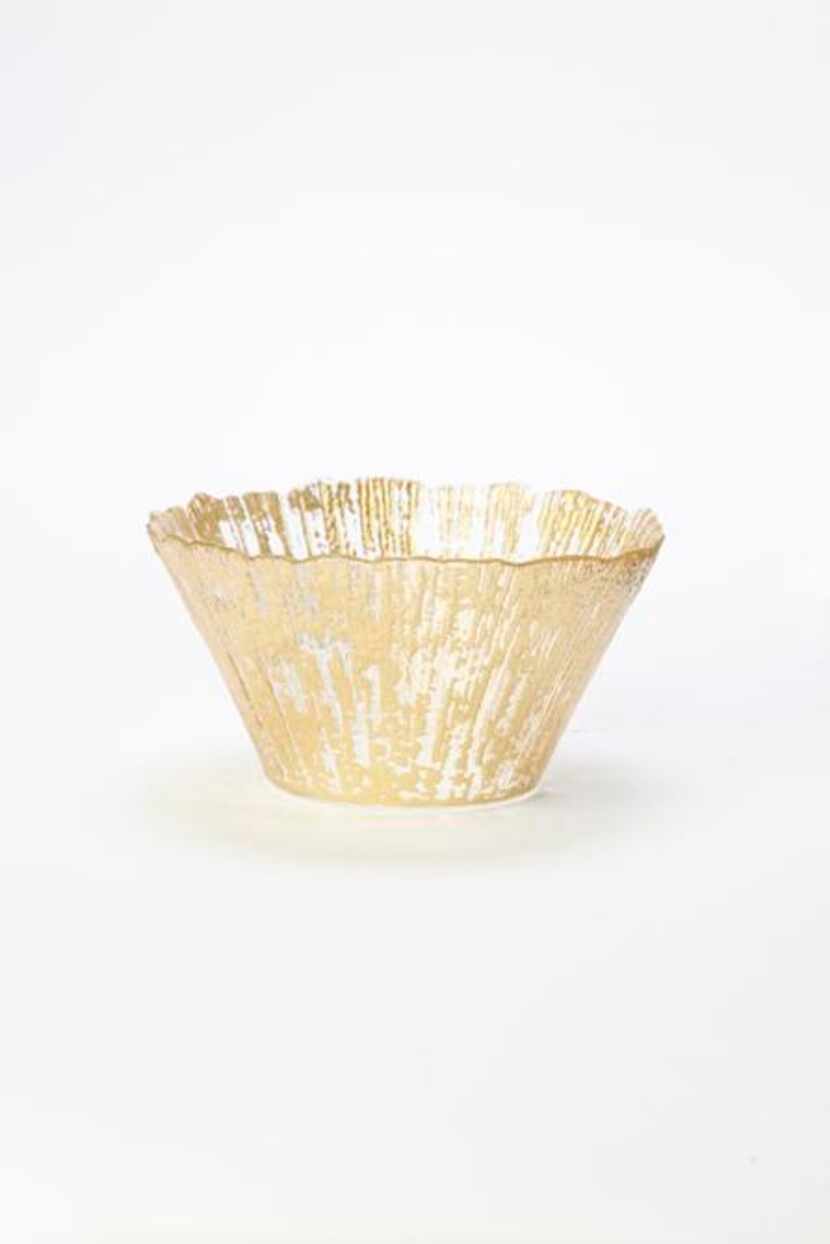 
Set to sparkle: Handcrafted in Turkey, this glass bowl accented with gold and a ruffled...