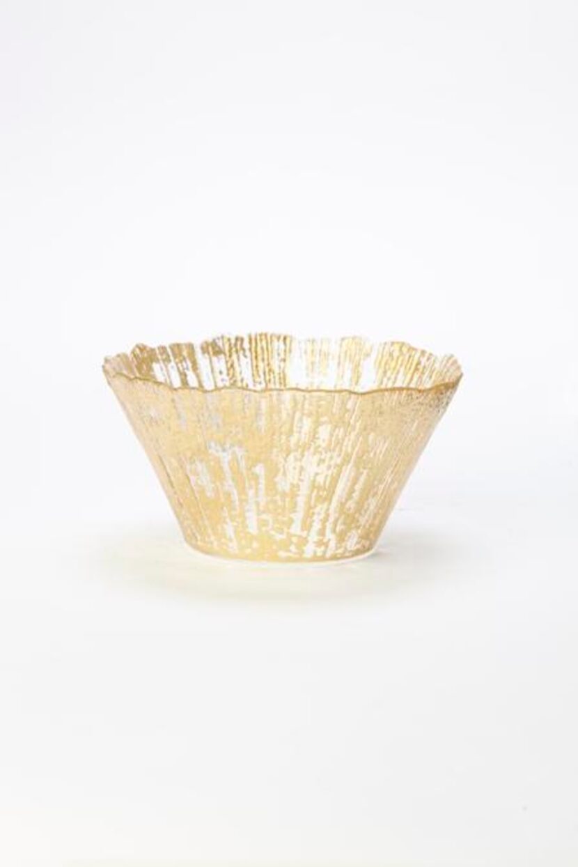 
Set to sparkle: Handcrafted in Turkey, this glass bowl accented with gold and a ruffled...