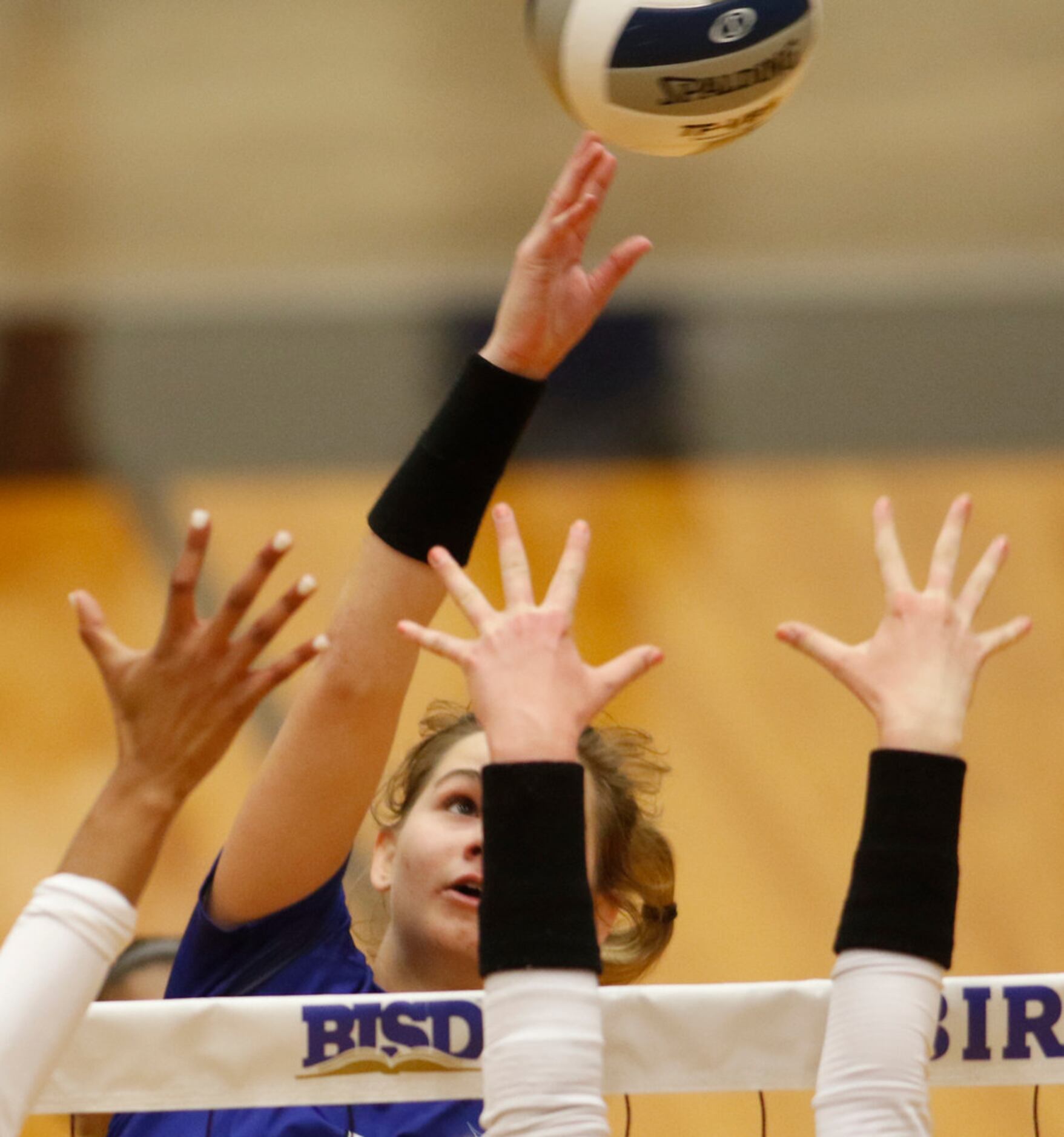 Trophy Club outside hitter Paige Flickinger (8) strategically places a shot to fall between...