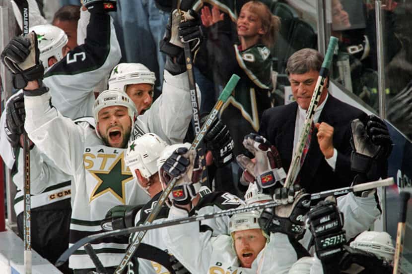  May 16, 1998--Â The Dallas Stars' bench celebrates after Derian Hatcher's goal in their 2-1...