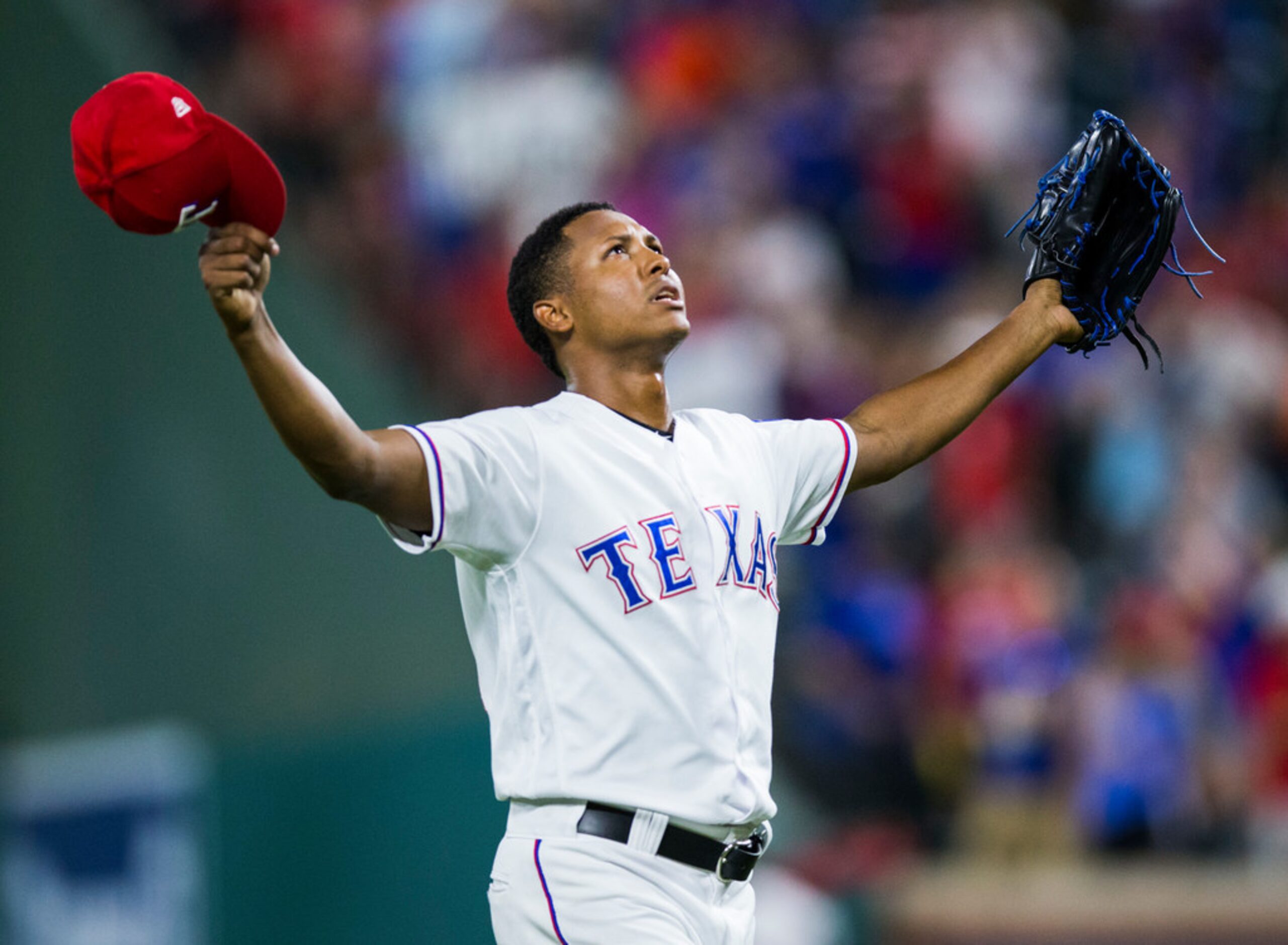 Texas Rangers relief pitcher Jose Leclerc (62) celebrates an 8-6 win over the Los Angeles...