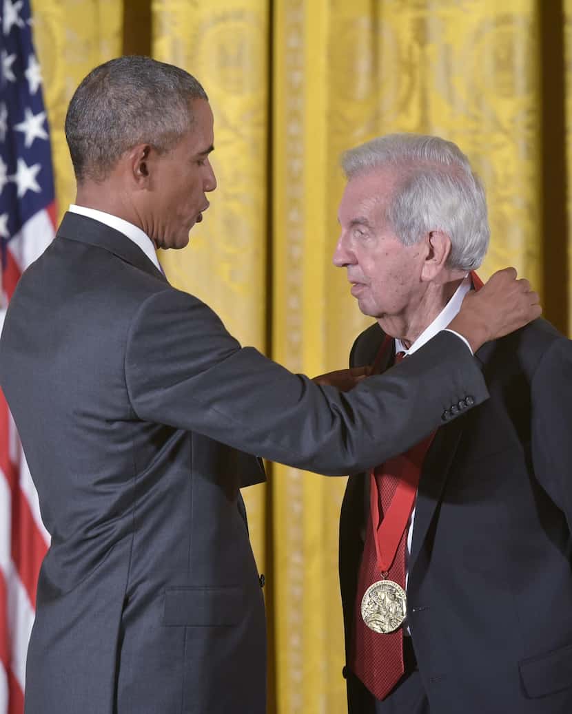 President Barack Obama presents the 2014 National Humanities Medal to writer Larry McMurtry...