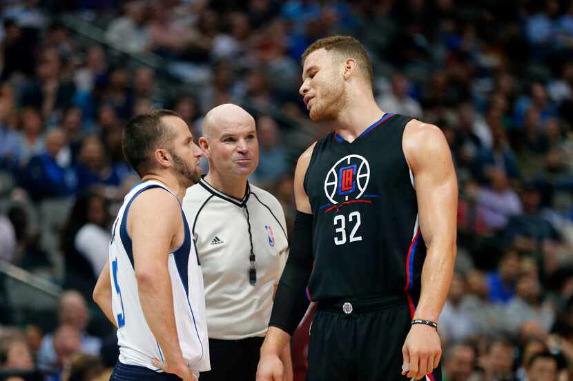 LA Clippers forward Blake Griffin (32) confronts Dallas Mavericks guard J.J. Barea (5) after...