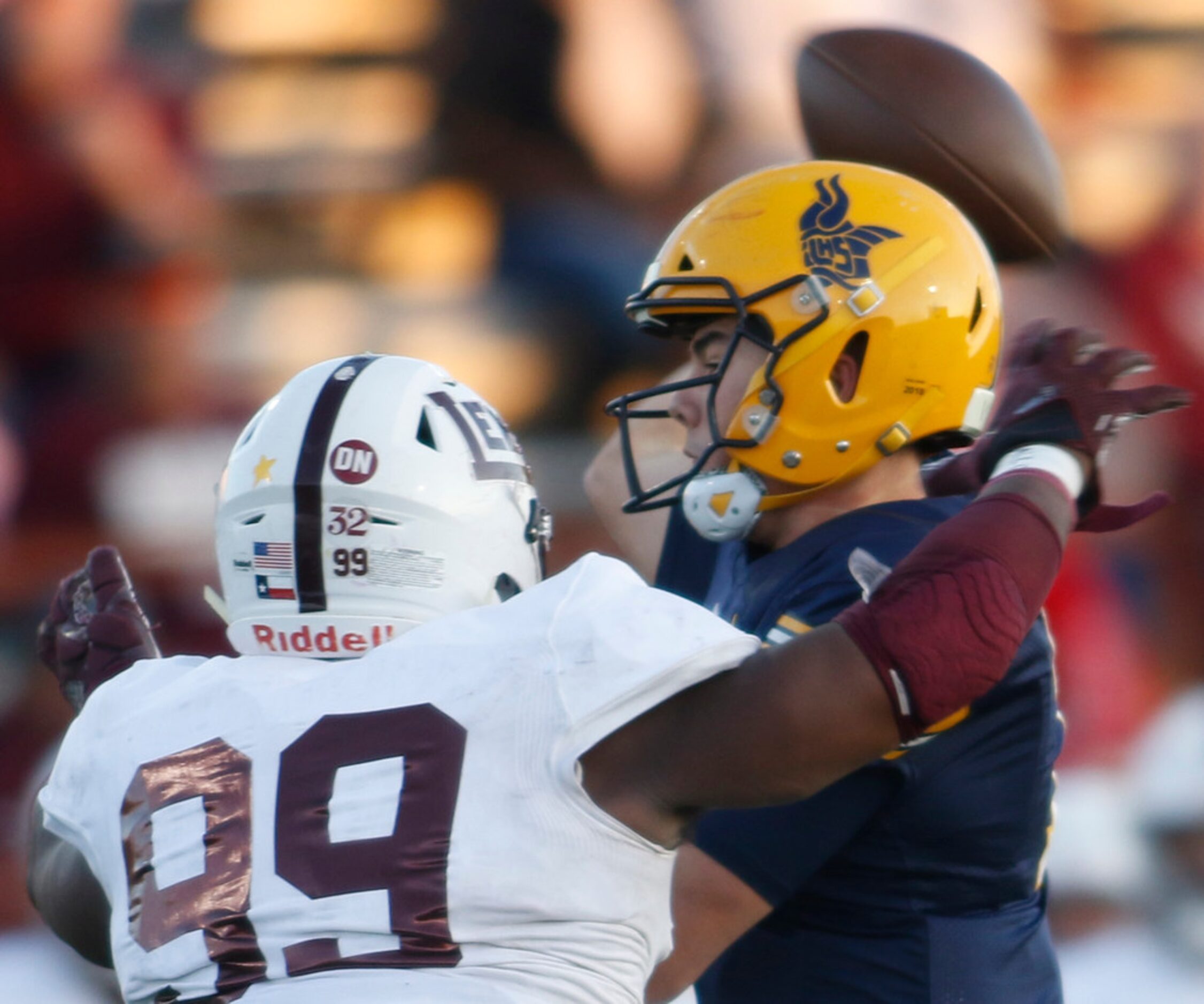 Arlington Lamar quarterback Jack Dawson (7) delivers a pass as Midland Lee defensive lineman...