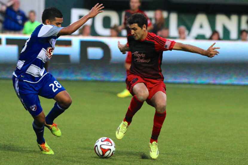 Portland Timbers midfielder Diego Valeri makes a move during Portland's 2-2 draw with FC...