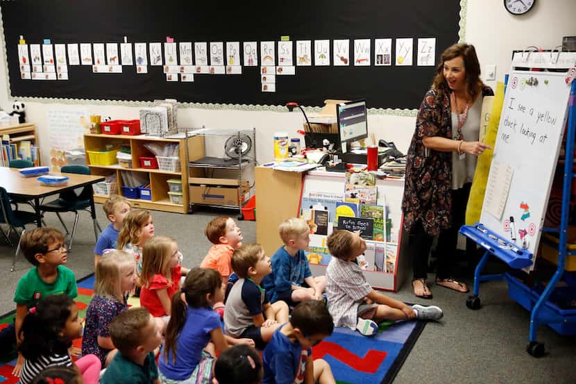 Kindergarten teacher, Amy Hardesty teaches her class at Fisher Elementary School in Frisco...