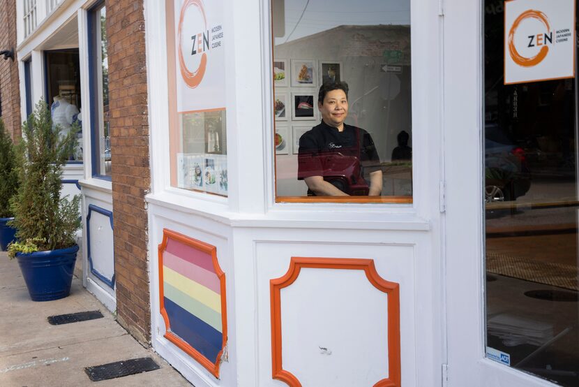 Michelle Carpenter, executive chef and founder of Zen Sushi, poses in her restaurant in the...