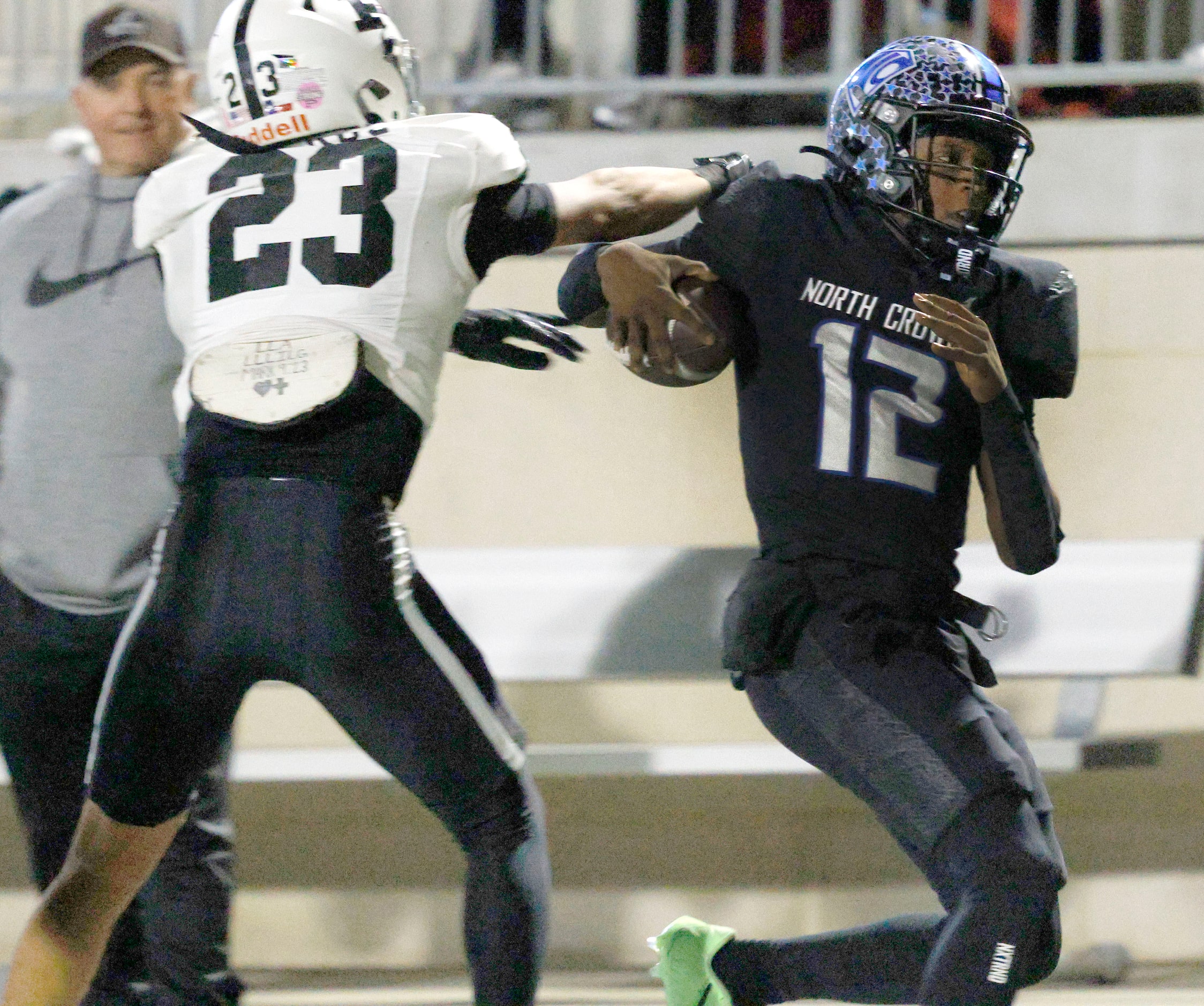 North Crowley's quarterback Chris Jimerson Jr. (12) carries the ball against Permian's Caleb...