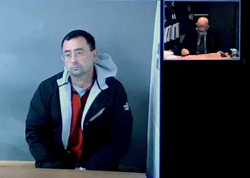 Former Michigan State University doctor Larry Nassar appeared via video link for his...