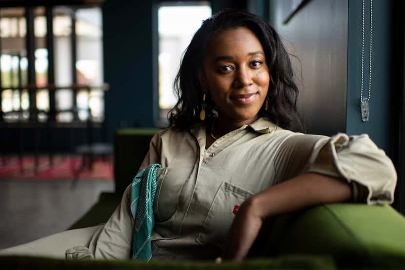 General Manager Jada Nicome sits on her favorite sofa inside Hotel Dryce in Fort Worth.
