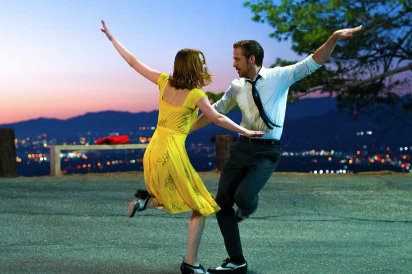 This image released by Summit Entertainment shows Ryan Gosling, right, and Emma Stone in a...