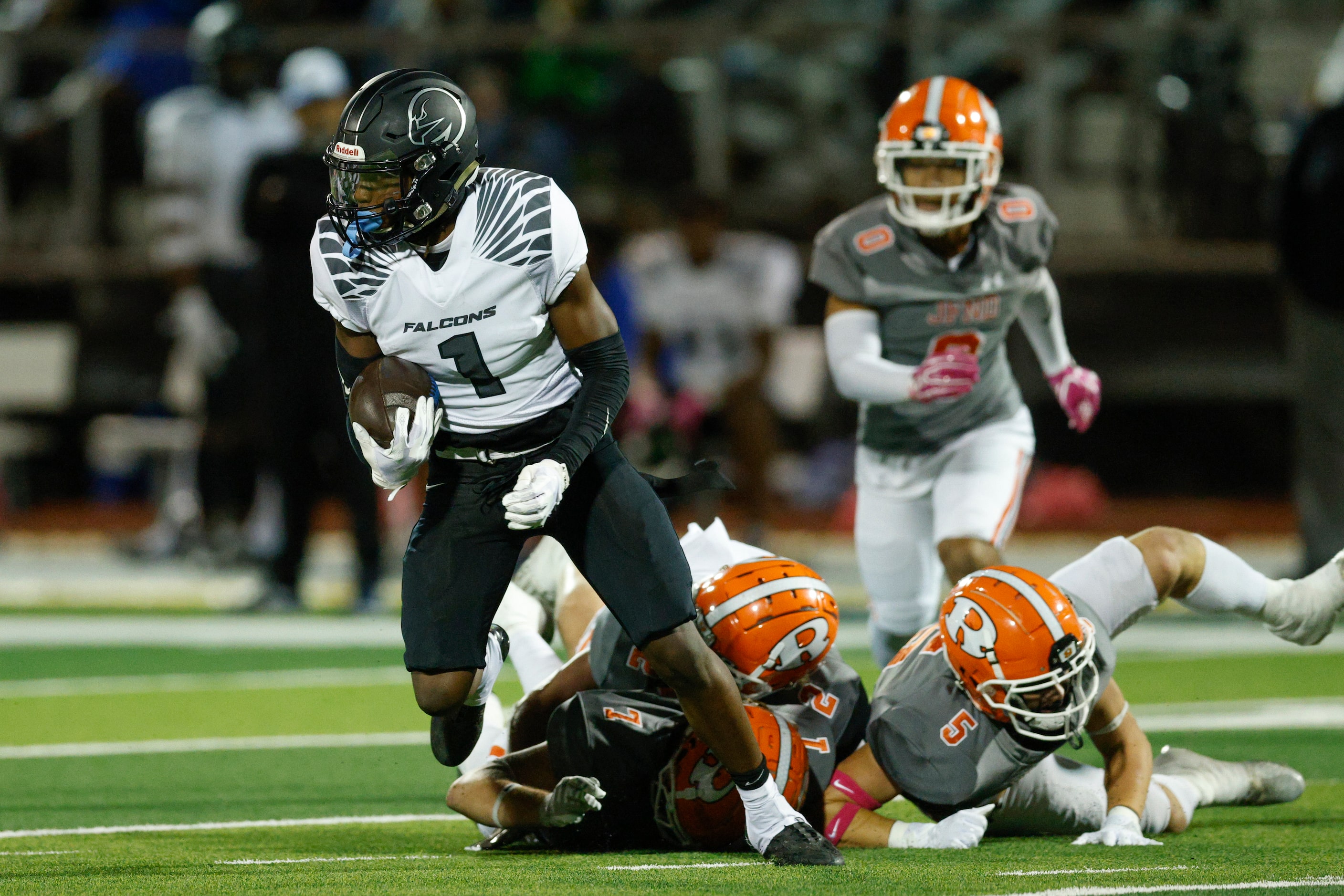 North Forney’s Amamii Branch (1) returns a kickoff during the first half of a District 10-6A...