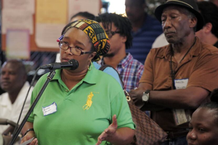 Olinka Green was among residents who lined up at Saturday's South Dallas town hall meeting...