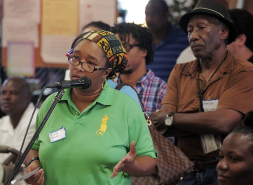 Olinka Green was among residents who lined up at Saturday's South Dallas town hall meeting...