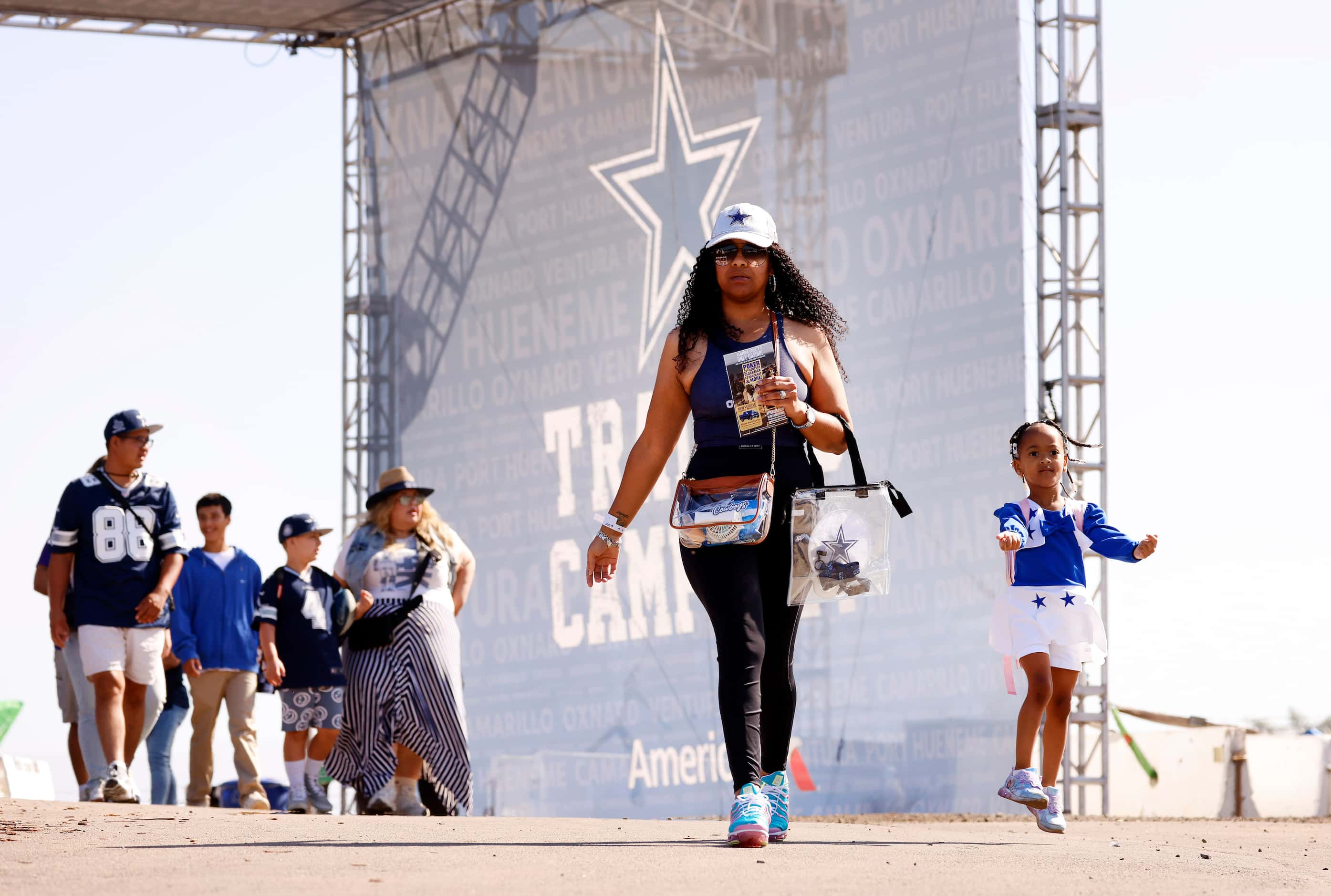 Jerrieka Albrow of Houston and daughter Kali Albrow, 4, dressed as a Dallas Cowboys...