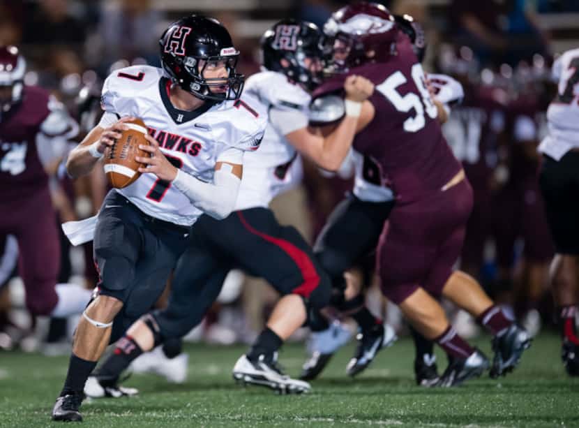 Rockwall-Heath quarterback Jordan Hoy (7) looks for a receiver during a 28-13 victory over...