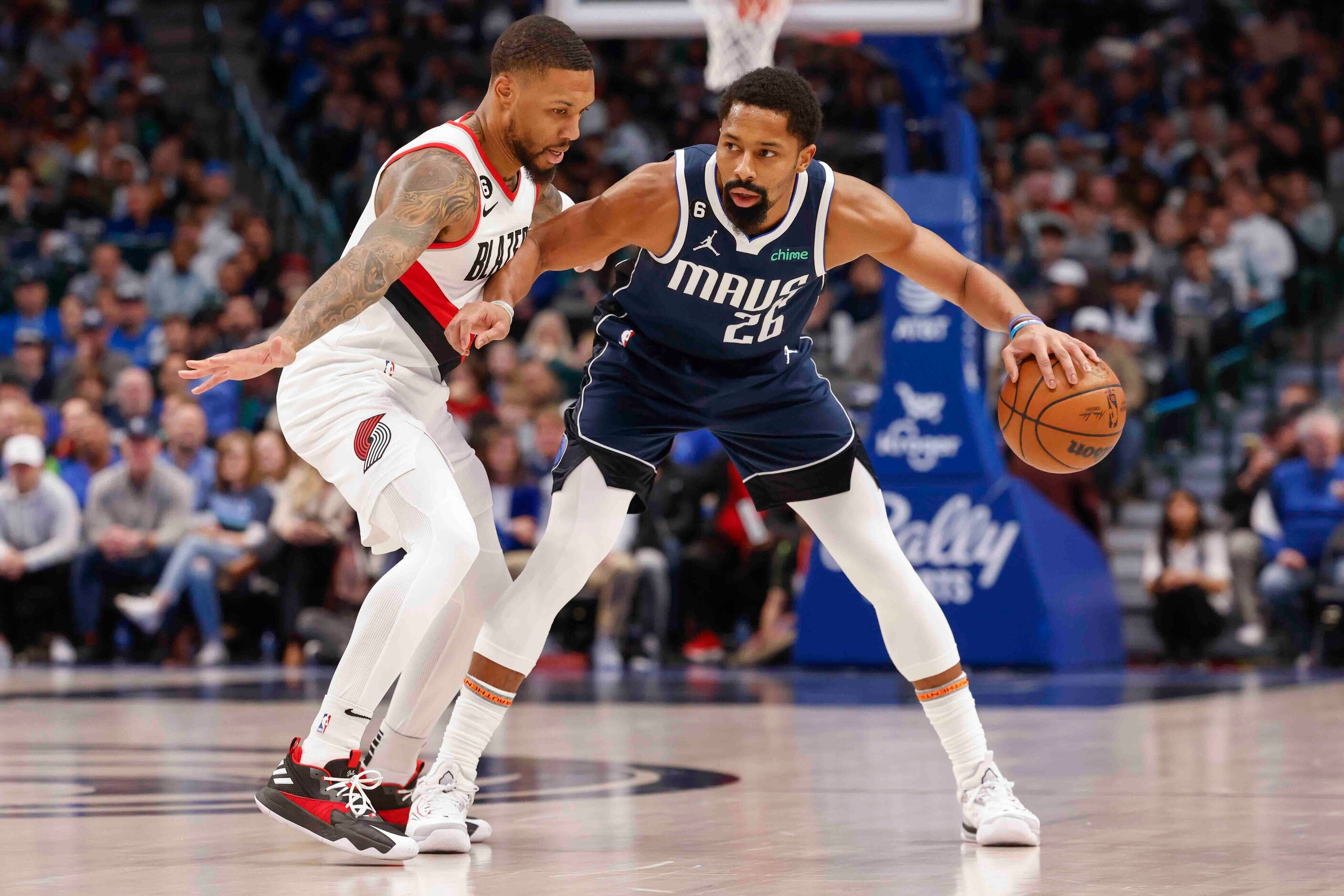 Dallas Mavericks guard Spencer Dinwiddie (26) guards the ball against Portland Trail Blazers...