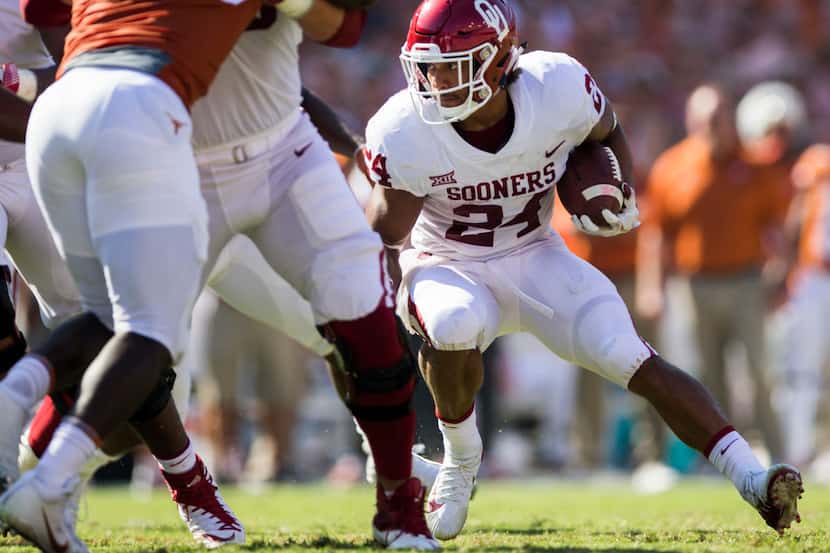 Oklahoma Sooners running back Rodney Anderson (24) runs the ball during the second quarter...