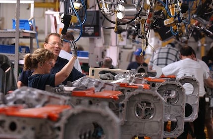 Workers assemble diesel engines at the Cummins, Inc., Jamestown Engine Plant near Jamestown,...