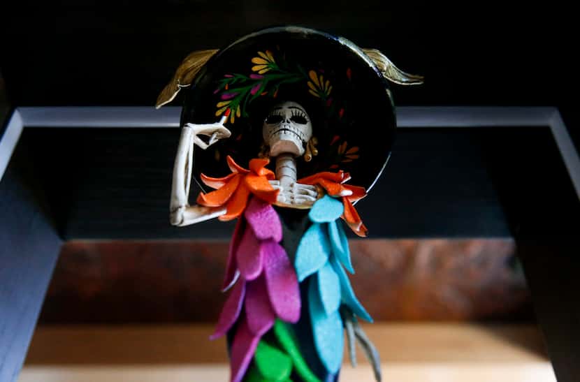 Co-owner Jessica Barnett commissioned 50 Catrina sculptures from Mexican artisans.
