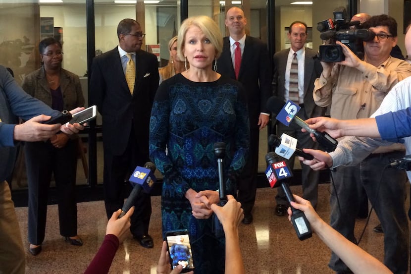 Dallas County District Attorney Susan Hawk talked to the media during a news conference...