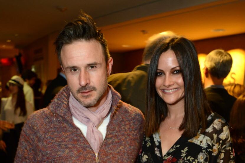 FILE - This Feb. 6, 2013 file photo shows actor David Arquette, left, and Christina McLarty...