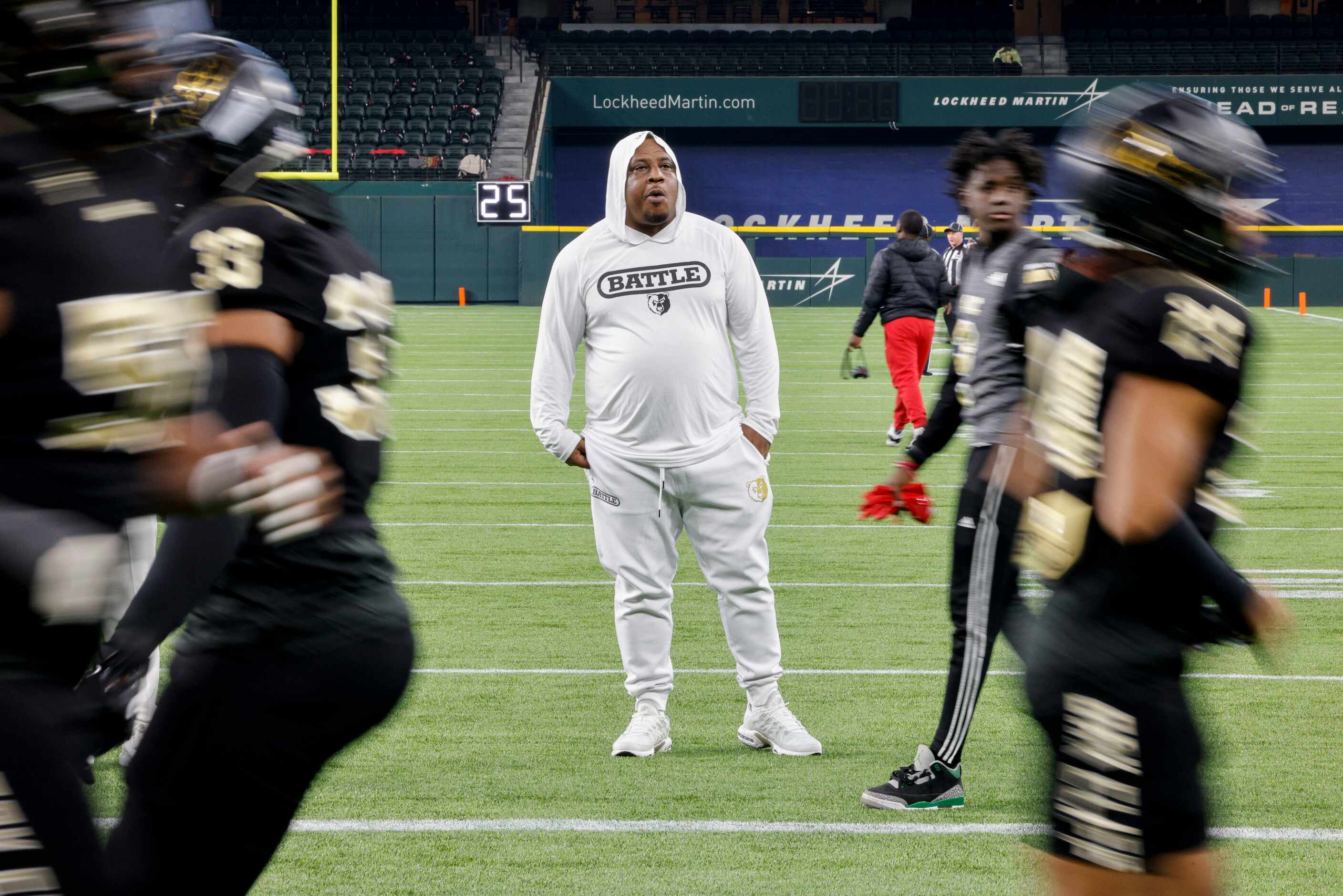 South Oak Cliff head coach Jason Todd watches as players warmup before the first half of a...