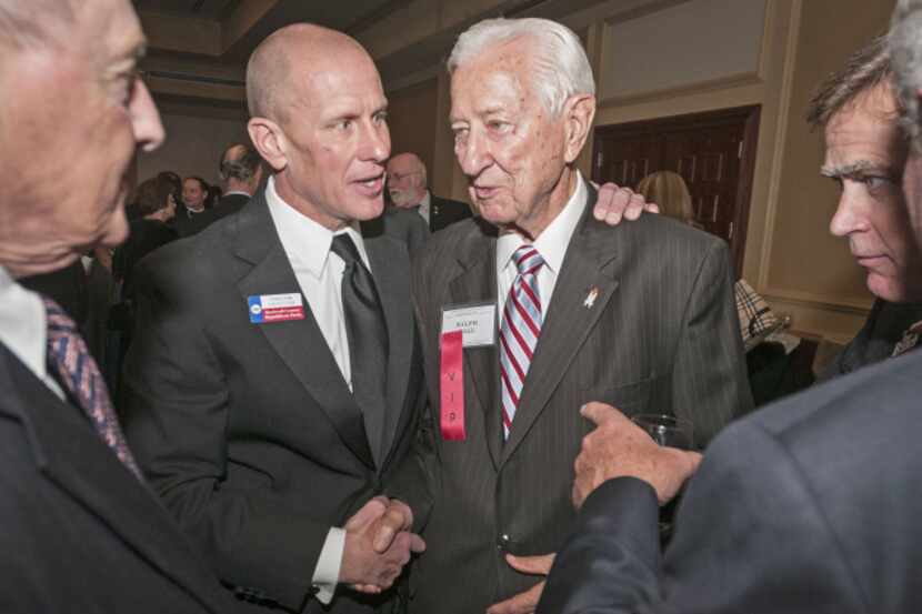 Congressman Ralph Hall (center right) shakes hands with Rockwall County GOP Chairman Tony...