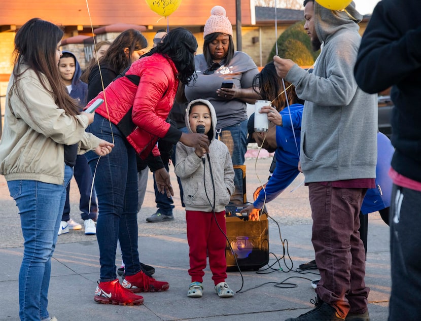 Benny Antero, 4, announces that it’s time to release the balloons in memory of his late...