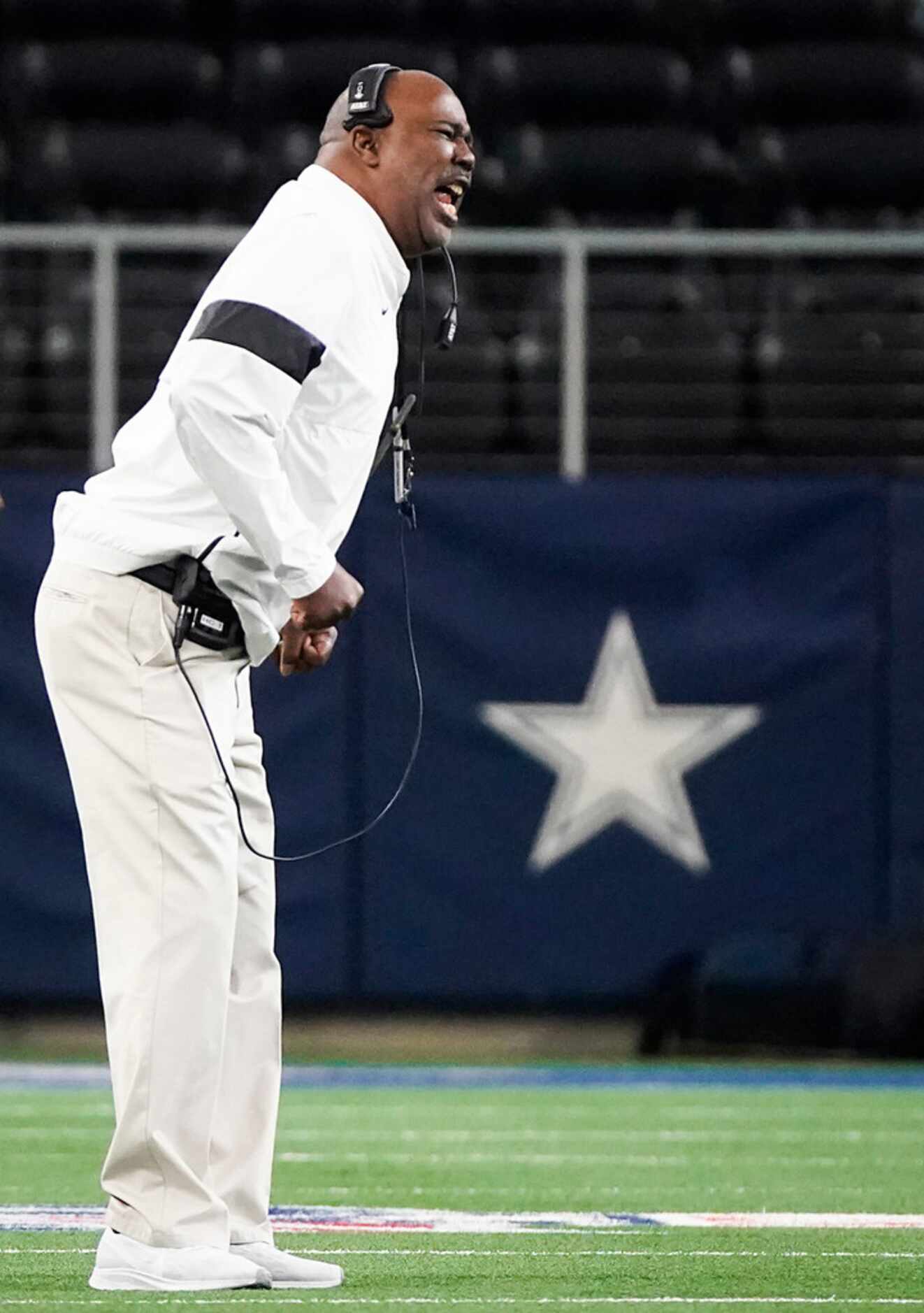 Duncanville head coach Reginald Samples reacts after a play during the first half of a Class...