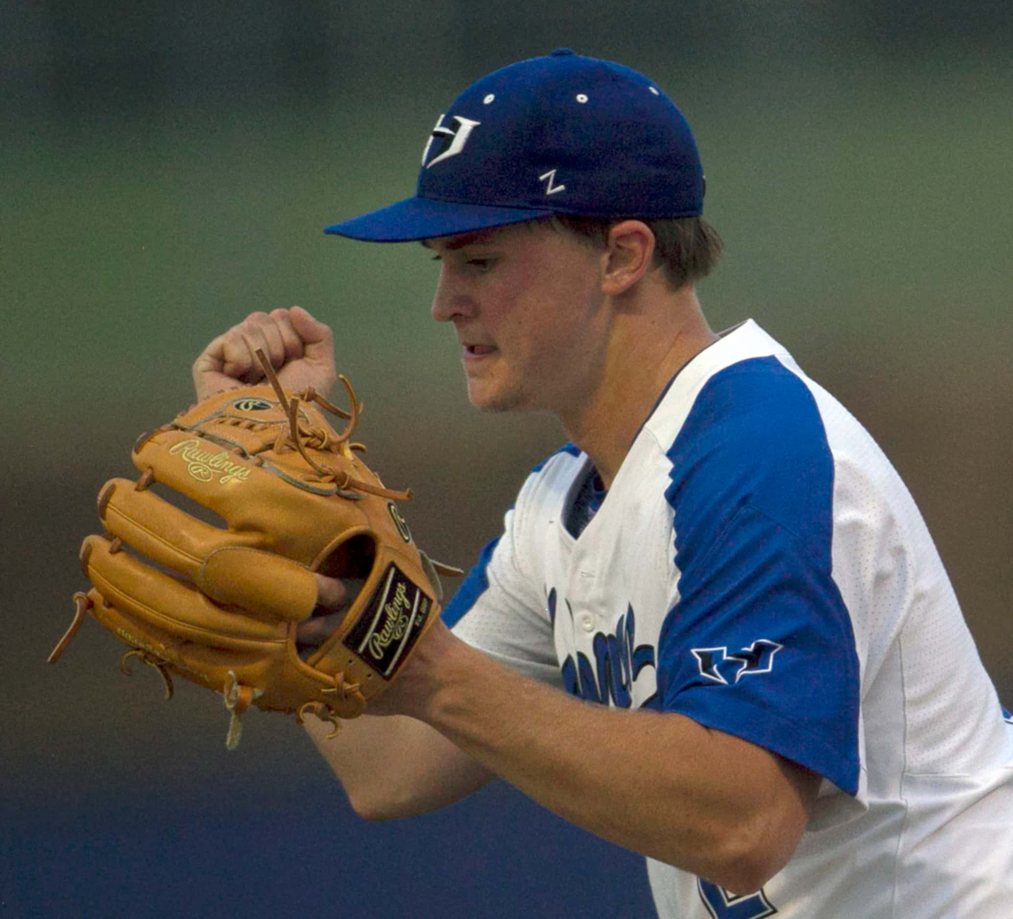 Hebron pitcher Jeremy Slate (2) pumps his fist in reaction to the final  out  that ended the...