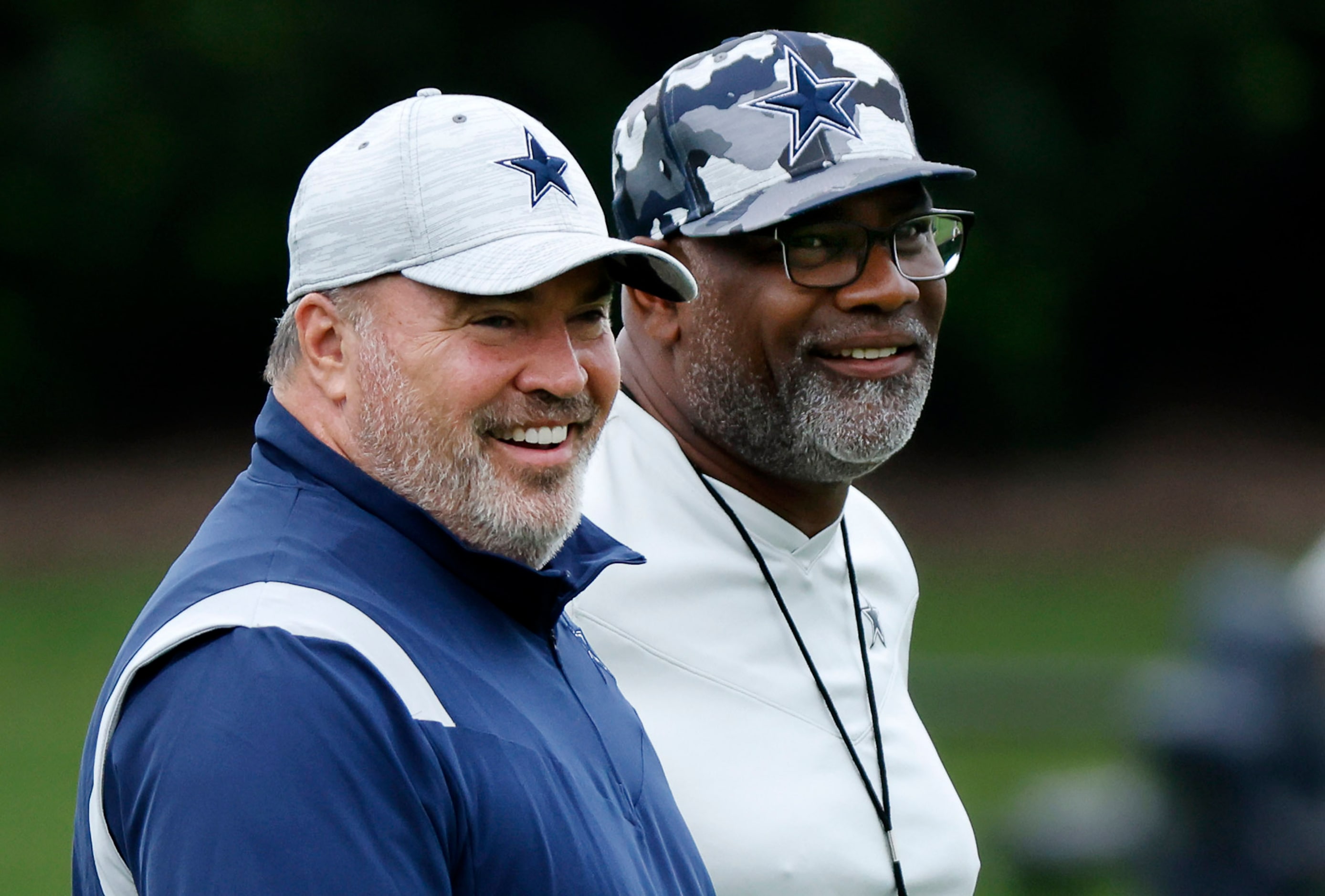 Dallas Cowboys head coach Mike McCarthy (left) and assistant head coach Rob Davis watch...