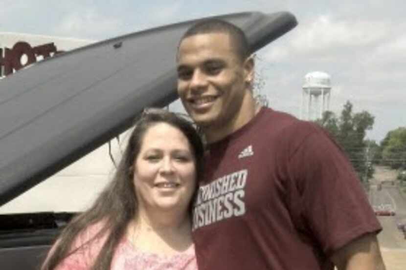 MSU QB Dak Prescott with his mom, Peggy Prescott. submitted by the family in December of 2012.