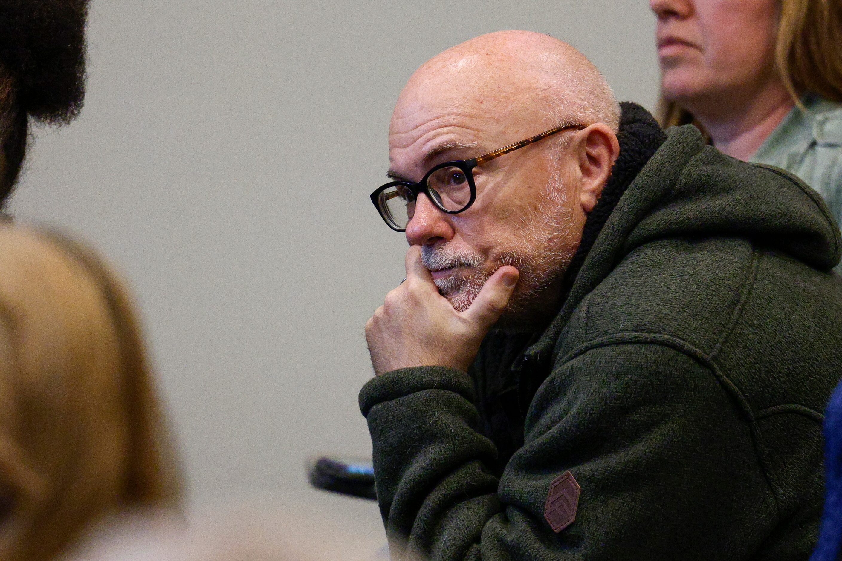 Duncanville resident Mark Graham listens during a city council meeting at Duncanville City...