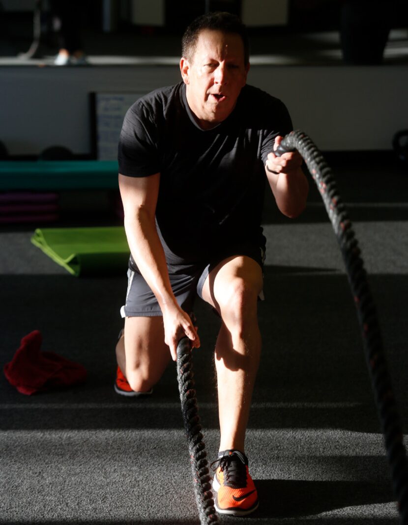 Kincel at the Battle Rope Lunges station, one of six station, during the Core Power session...