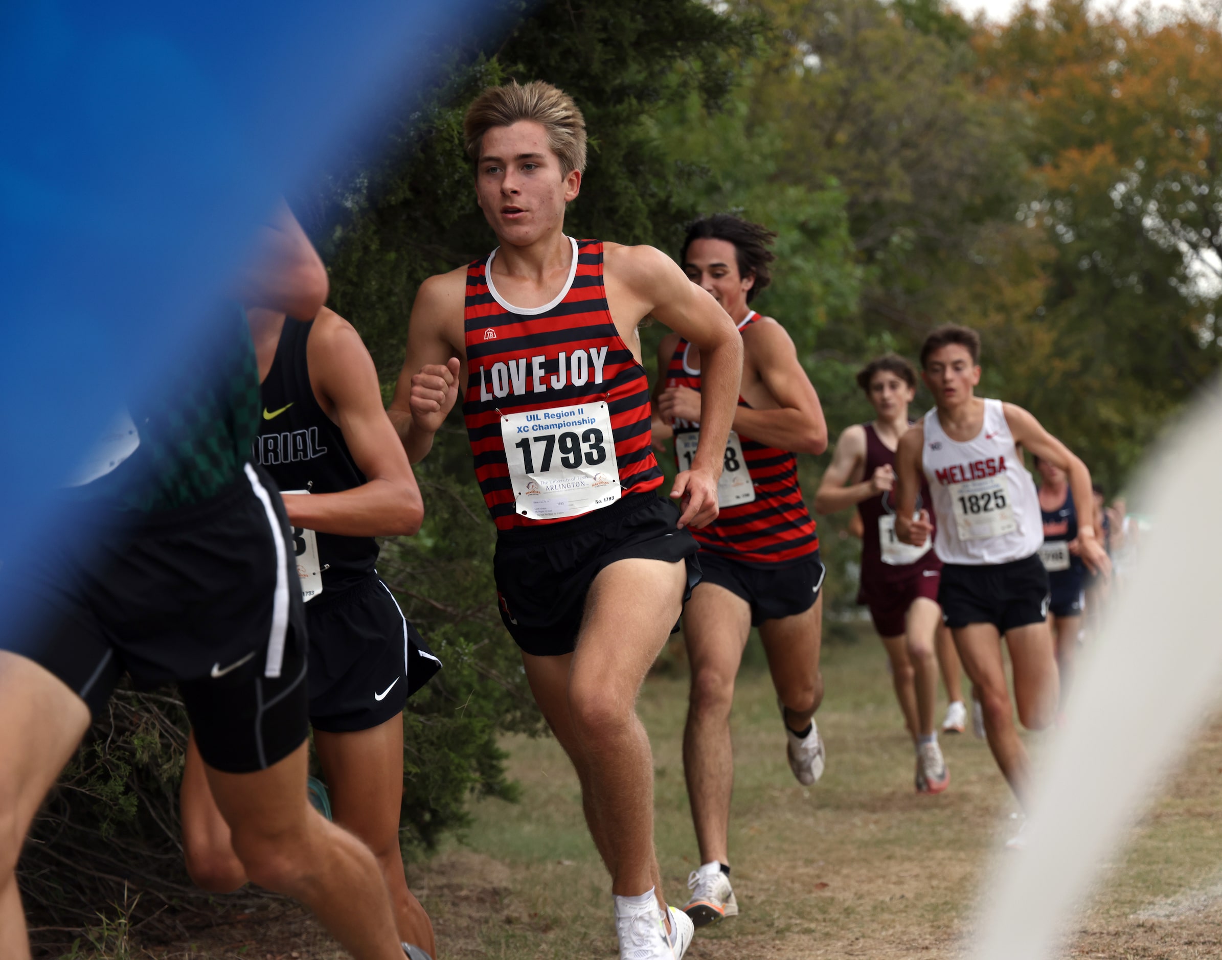 Lucas Lovejoy junior Caden Gary (1793) passes the midpoint of the Boys Class 5A Region 2...